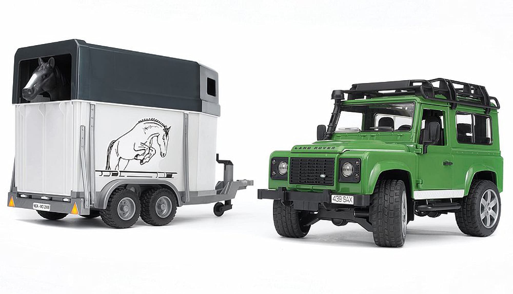Bruder 02592 Land Rover Defender with Horse Trailer and Horse, 1:16 — gift idea